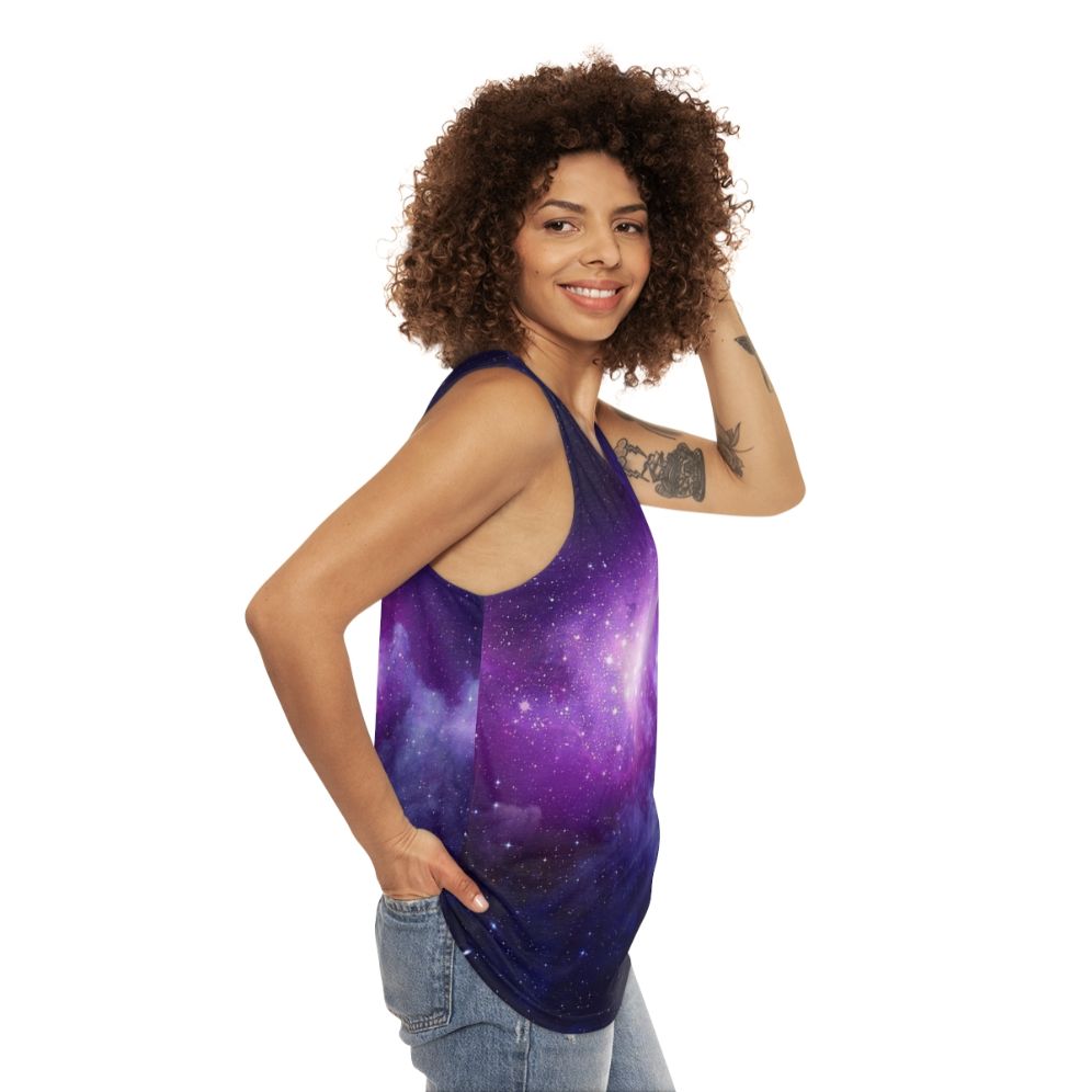 Vibrant galaxy unisex tank top with starry night design - women side