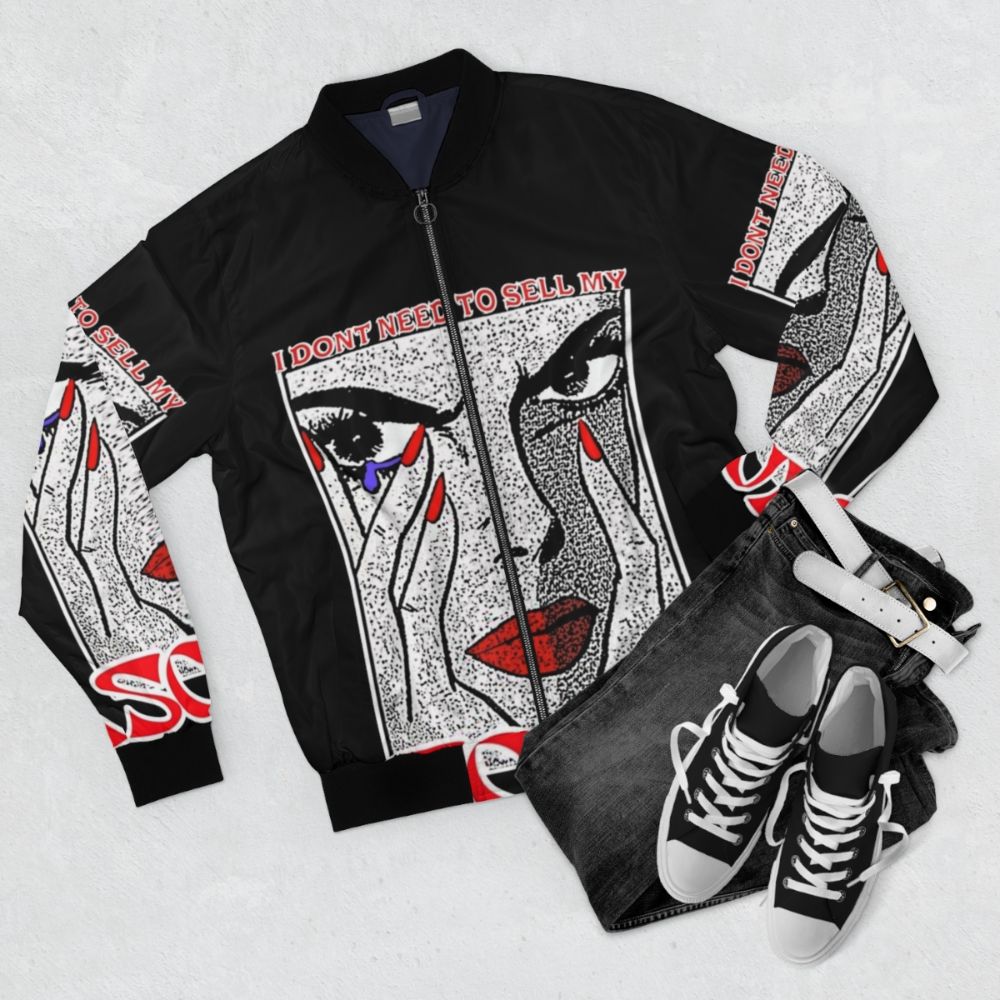 Stylish bomber jacket with "I Don't Need to Sell My Soul" quote design - Flat lay