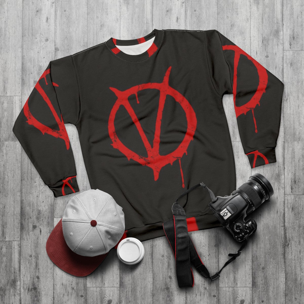 Vintage V for Vendetta symbol graphic on black sweatshirt - flat lay