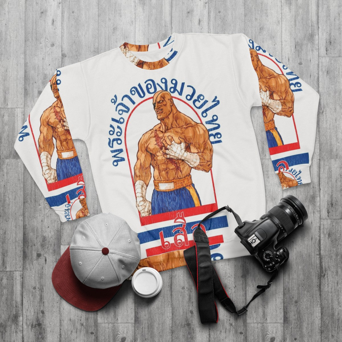 Sagat the God of Muay Thai wearing a gray sweatshirt - flat lay