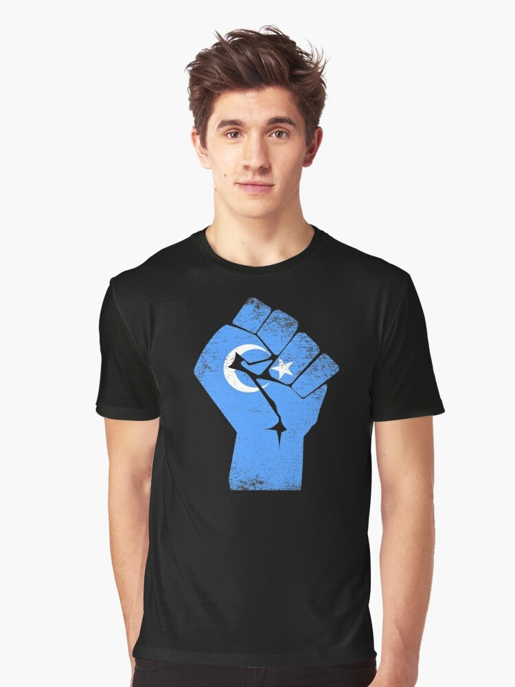 Free the Uyghurs graphic t-shirt with text supporting the Uyghur people and condemning China's human rights abuses. - Men