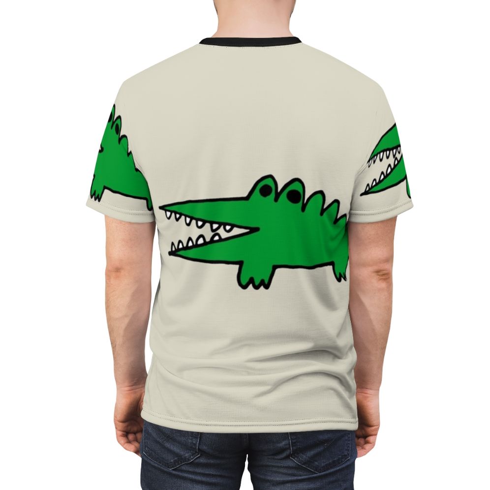 Whimsical illustration of a cartoon alligator facing big challenges on a vintage-style t-shirt - men back