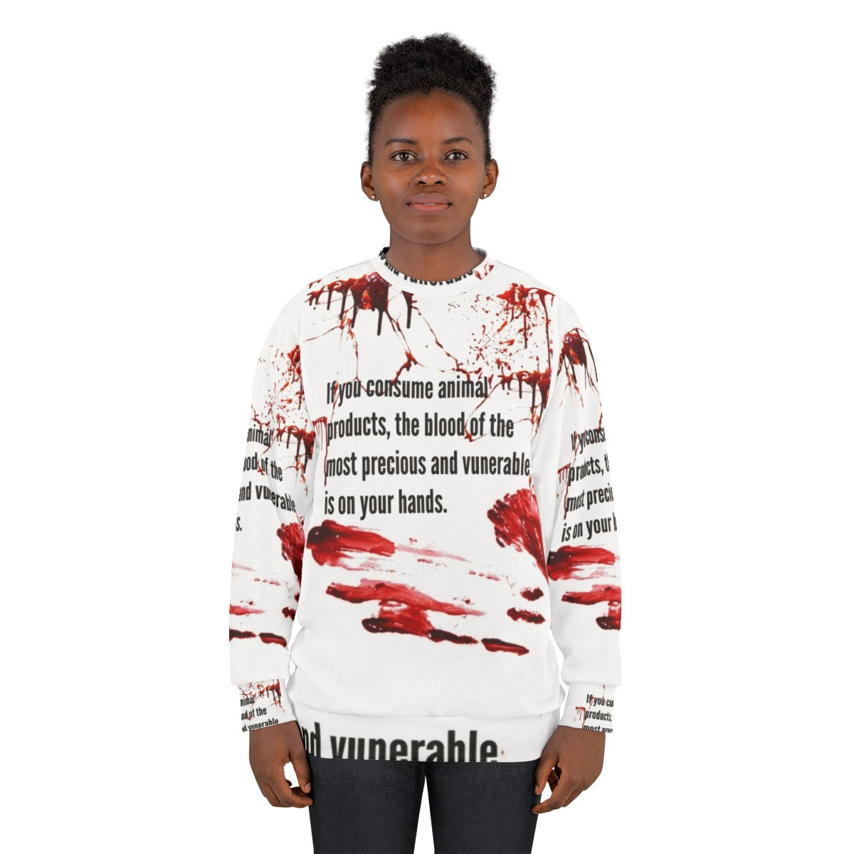 Animal rights activist wearing vegan sweatshirt with "Blood Is On Your Hands" message - women