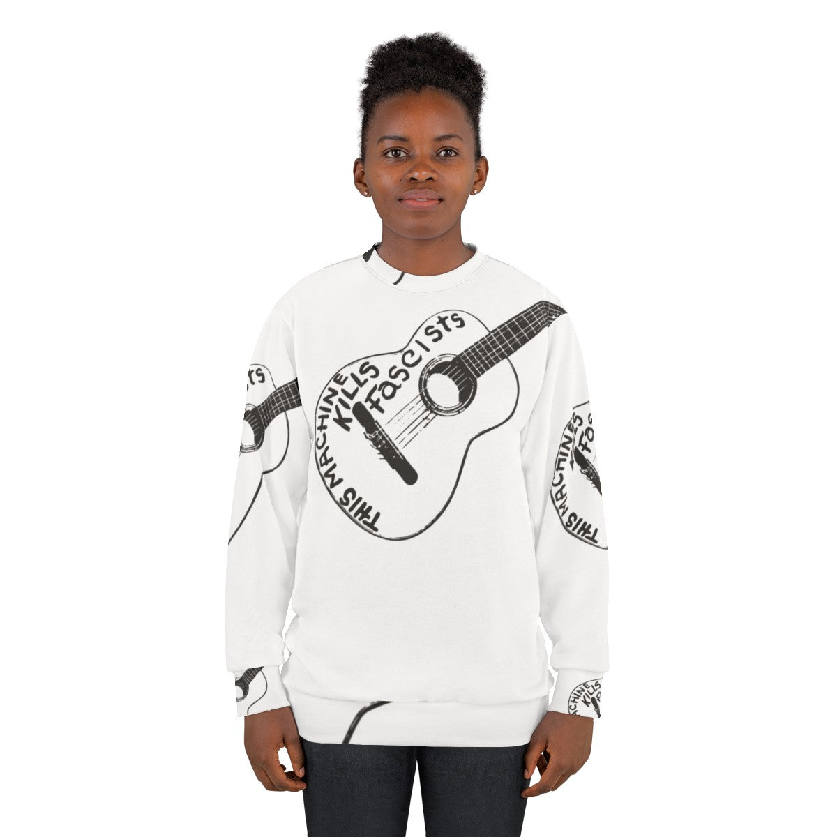 Woody Guthrie's iconic "This Machine Kills Fascists" slogan printed on a black sweatshirt - women