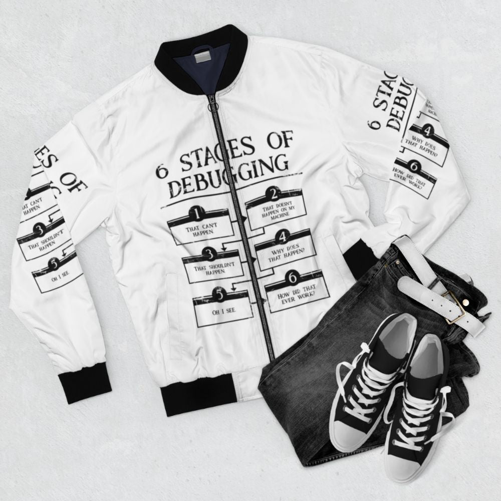 Bomber jacket with "6 Stages of Debugging" design for programmers and software engineers - Flat lay