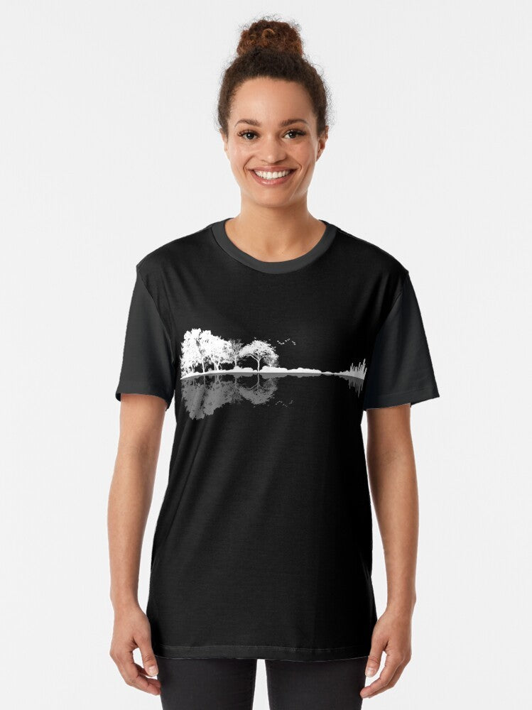 Minimalist landscape design featuring a nature-inspired guitar silhouette on a t-shirt - Women