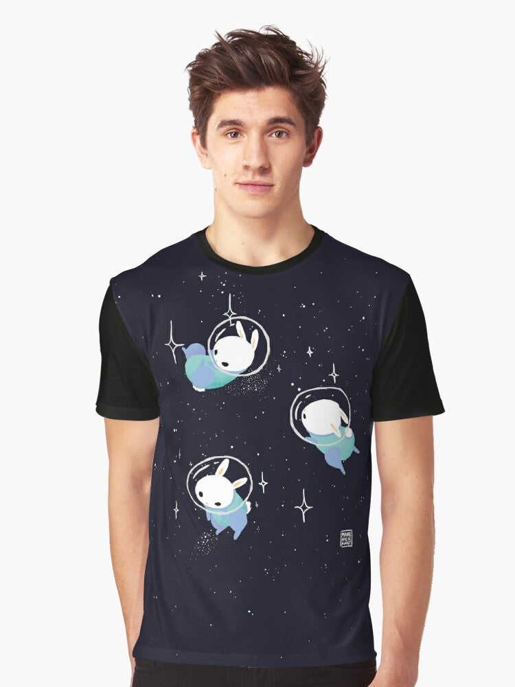 Adorable space bunnies in a digital illustration, featuring a cute, kawaii design with stars, planets, and a galaxy background. - Men