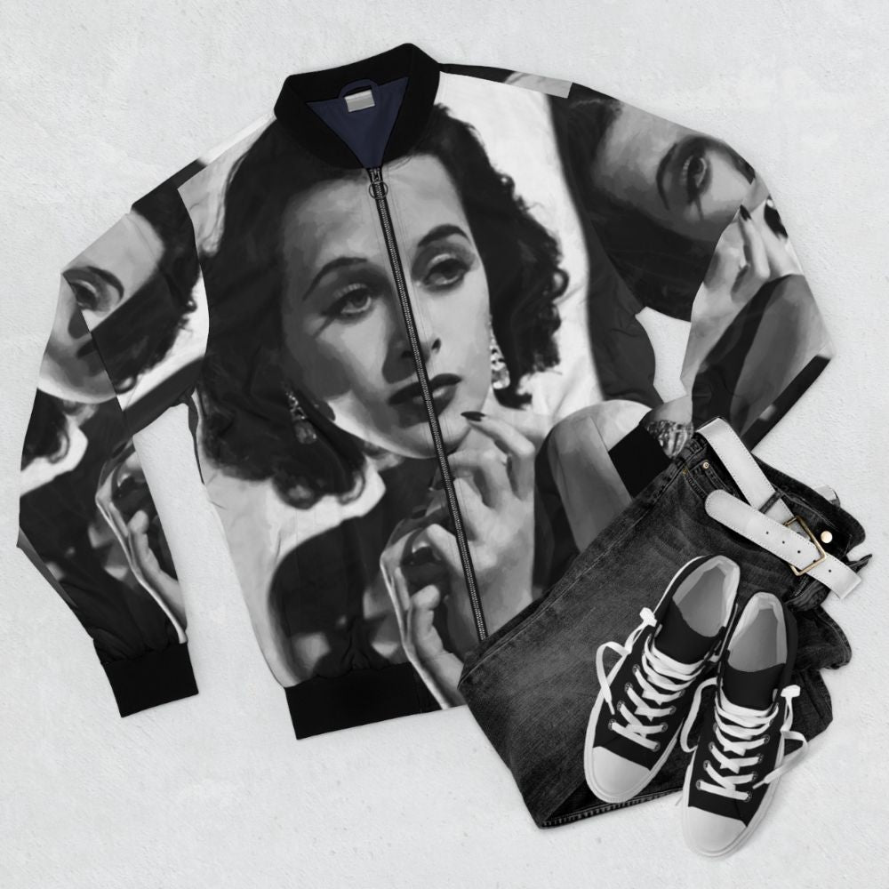 Vintage bomber jacket featuring a portrait of Hedy Lamarr, the iconic Hollywood actress and inventor - Flat lay