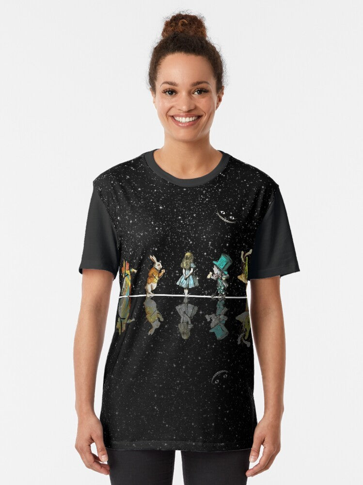 Surreal graphic tee featuring Alice in Wonderland characters against a starry night sky background. - Women