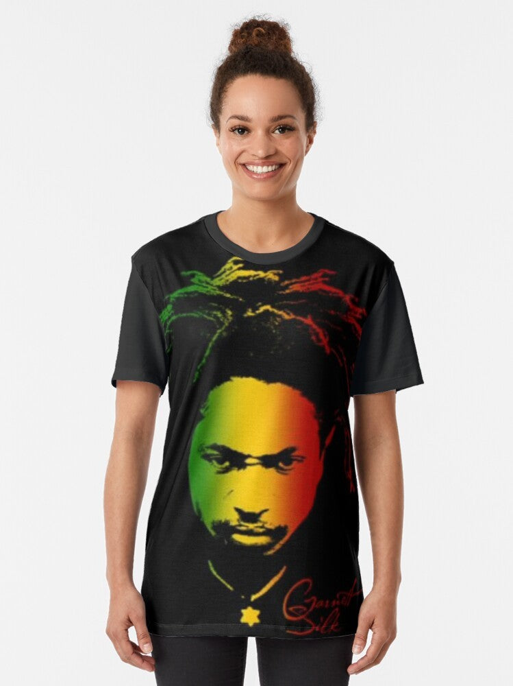 Rasta graphic t-shirt with garnet silk design featuring "nothing can divide us" and "love is the answer" messages - Women