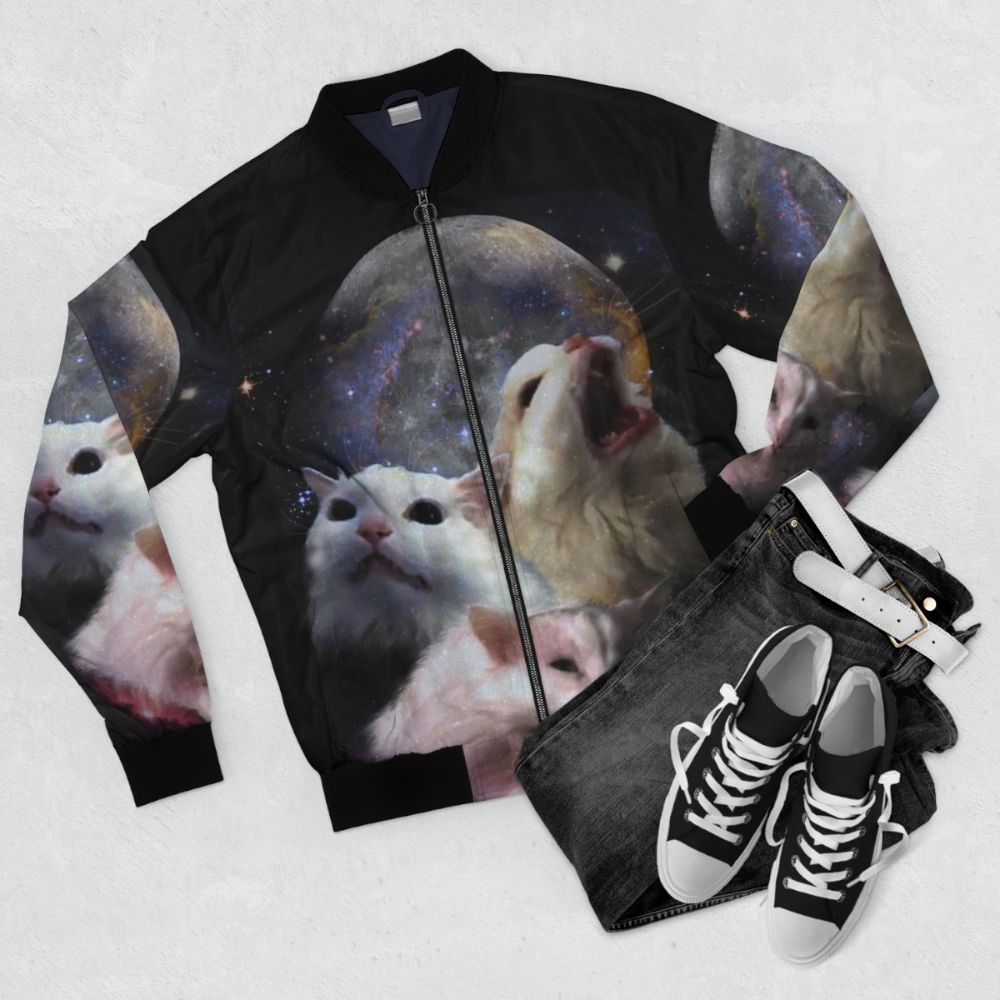 A bomber jacket featuring a graphic design of Thurston the cat on the moon. - Flat lay