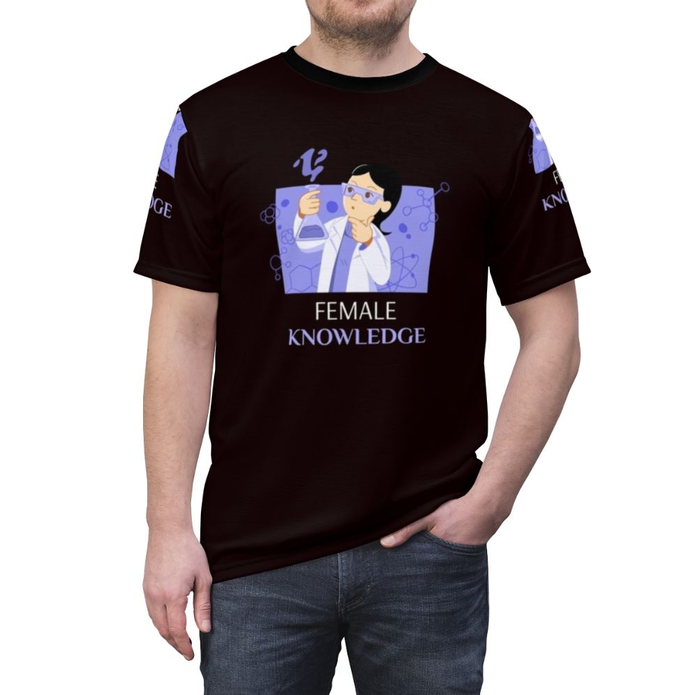 A t-shirt design featuring the text "Female Knowledge Fun Science" with symbols and imagery related to science, feminism, and female empowerment. - men front