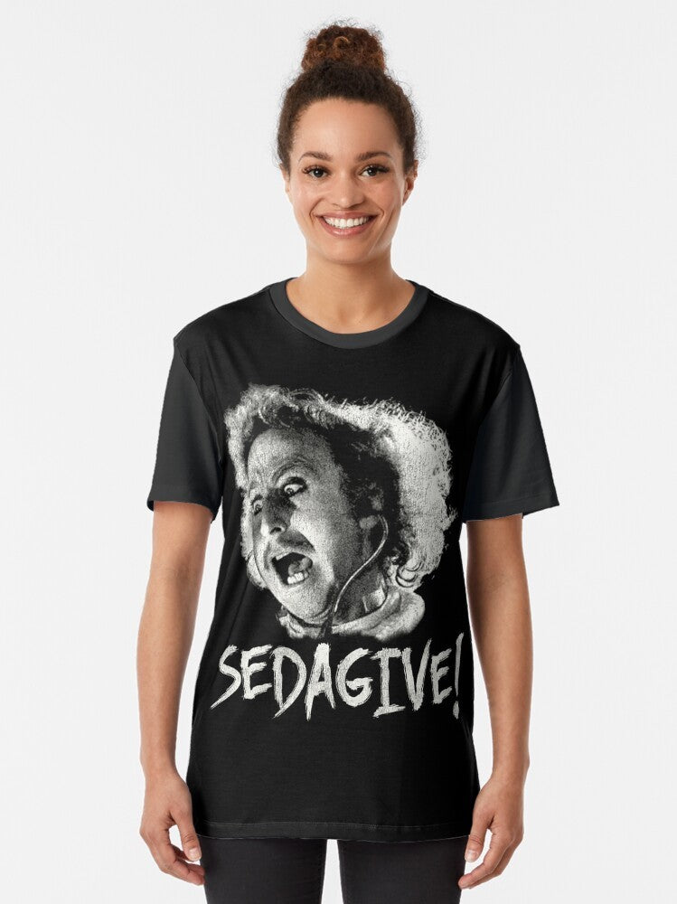 A graphic t-shirt featuring the iconic "Sedagive!" quote from the classic comedy film "Young Frankenstein" starring Gene Wilder. - Women