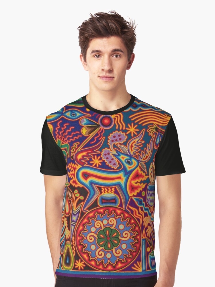 Vibrant Huichol-inspired graphic t-shirt featuring colorful Mexican cultural elements and symbols like skulls, flowers, and abstract patterns. - Men