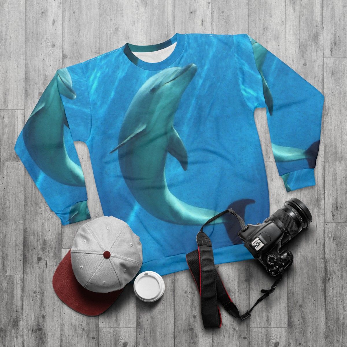 Colorful dolphin fantasy graphic on a modern sweatshirt - flat lay