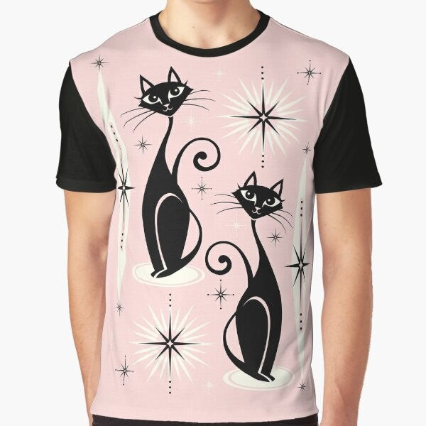 Mid century modern graphic t-shirt featuring atomic-inspired cats and starbursts in a warm pink design