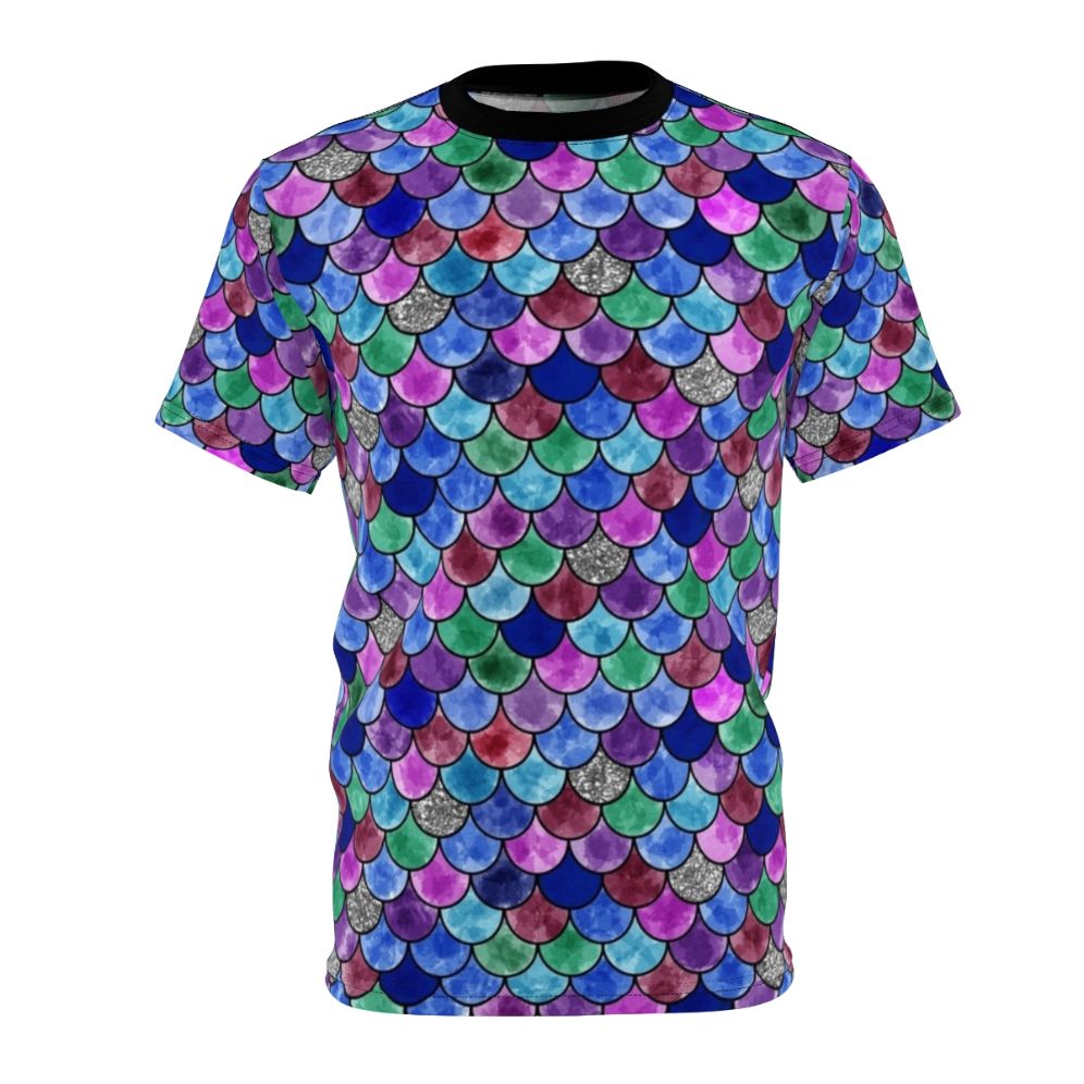 A colorful t-shirt featuring a whimsical watercolor illustration of a rainbow fish with glittery scales.