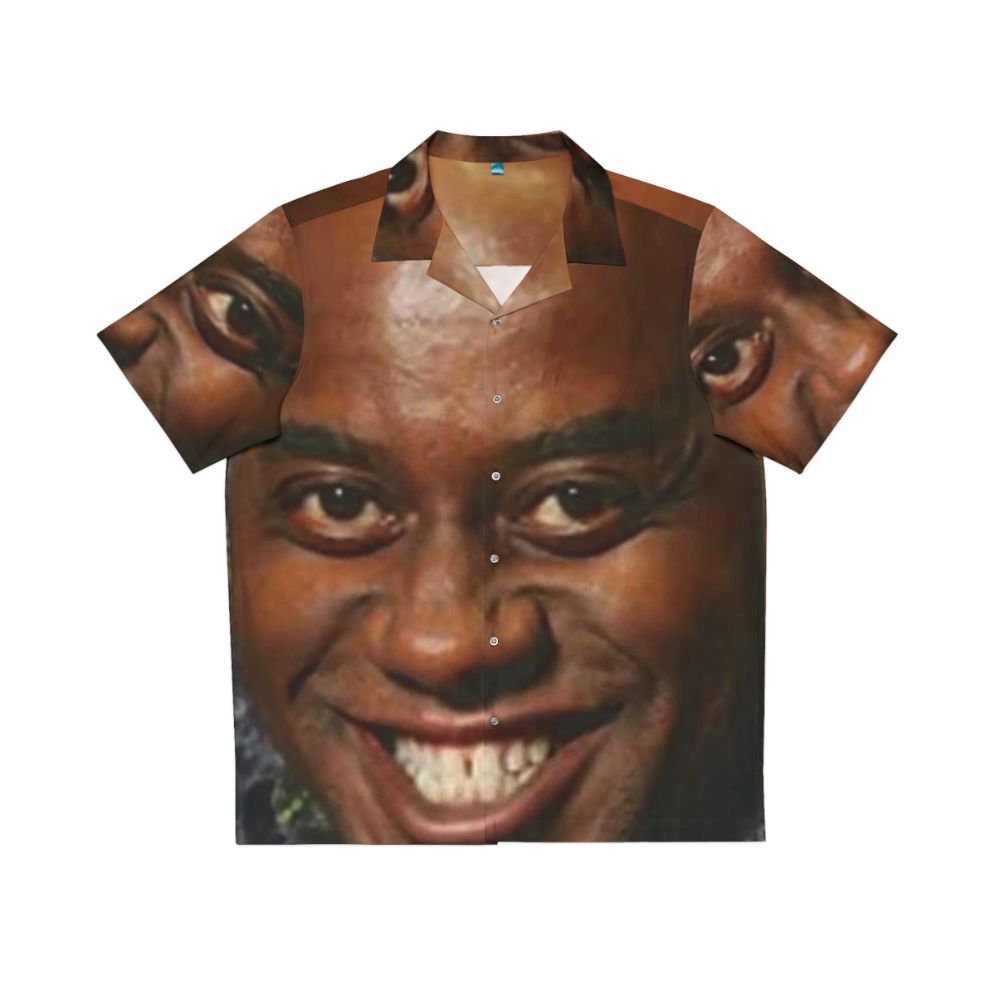 Ainsley Harriott wearing a large, spicy Hawaiian shirt