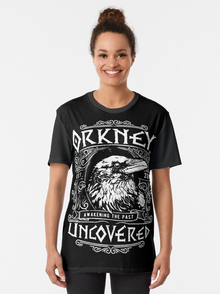 Orkney Raven Graphic T-Shirt featuring a majestic raven design inspired by Viking mythology - Women