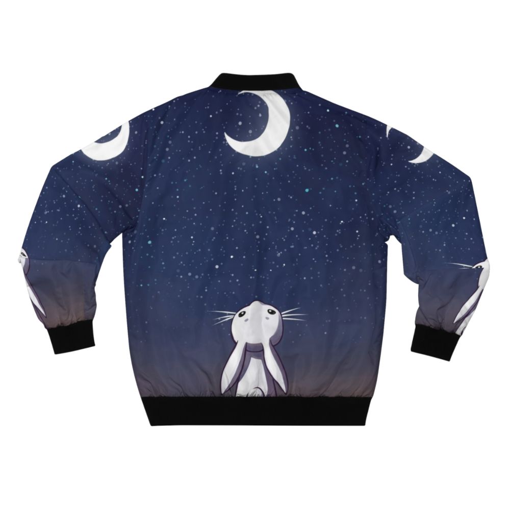 A blue children's bomber jacket with a cute bunny and moon design. - Back