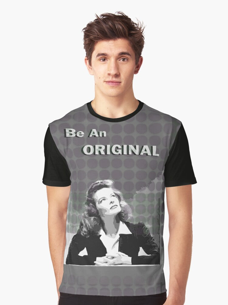 Graphic t-shirt with a portrait illustration of Katharine Hepburn, a famous movie star known for her iconic fashion style and trouser suits. - Men