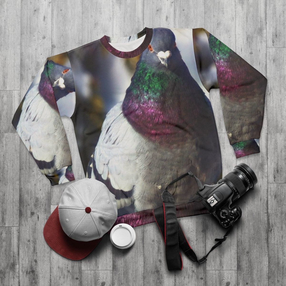 Feral pigeon sweatshirt featuring a cute pigeon design - flat lay