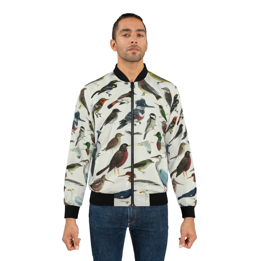 Stylish bomber jacket featuring illustrations of various bird species, including warblers, herons, hummingbirds, and more. - Lifestyle