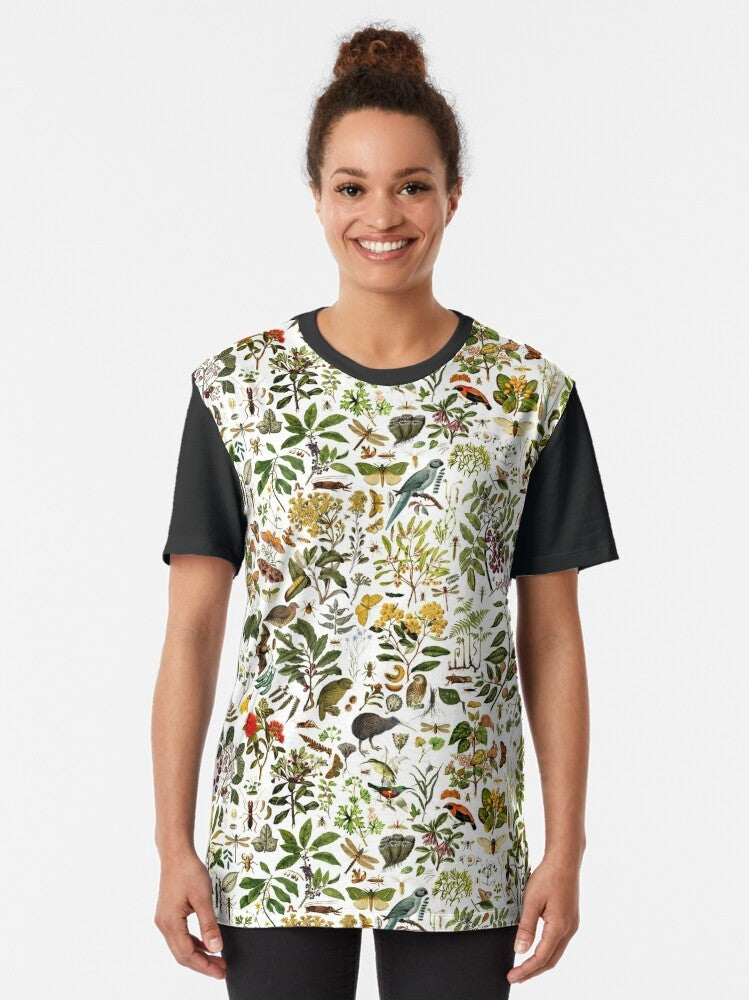 New Zealand biology graphic t-shirt with a collage design featuring butterflies, birds, insects, and native flora and fauna. - Women