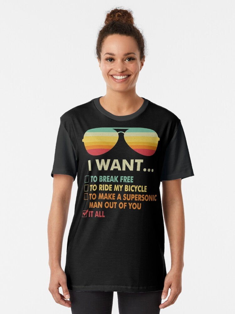 Queen "I Want It All" graphic t-shirt for music lovers featuring a bicycle costume design - Women