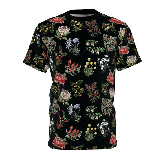 Lino print t-shirt featuring a colorful arrangement of native Australian flowers including wattle, flowering gum, and kangaroo paw.