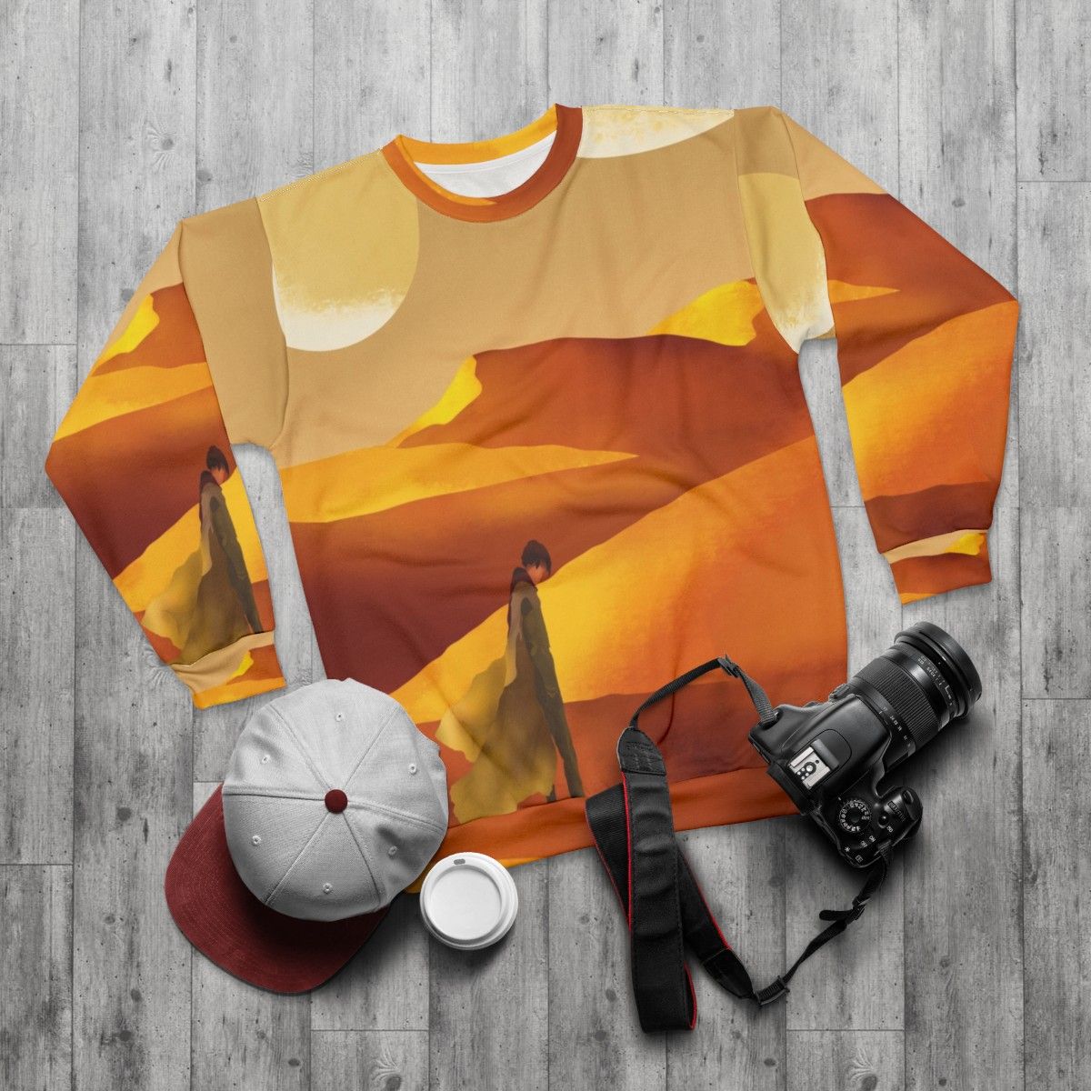 Dune movie inspired sweatshirt with sandy landscape and moons - flat lay