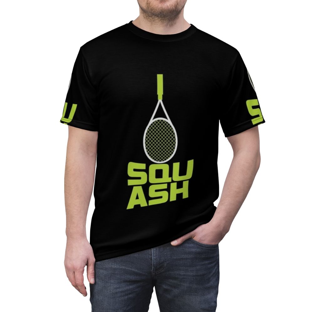 Squash racket and sports ball graphic printed on a high-quality t-shirt, perfect for squash and sports enthusiasts. - men front