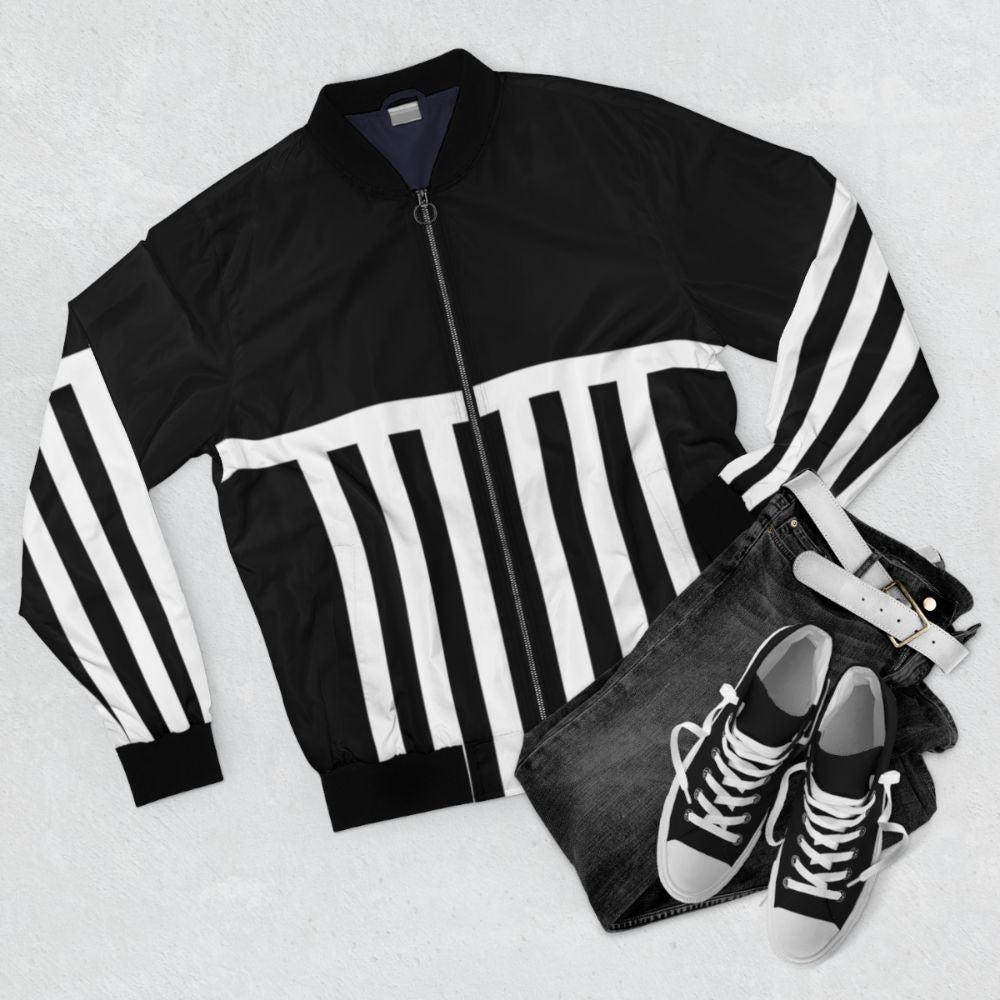 Port Adelaide Power Prison Bars Bomber Jacket with black and white stripes - Flat lay