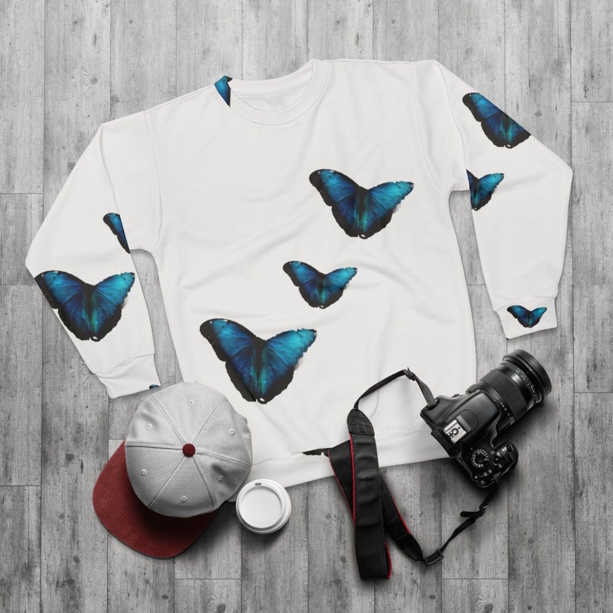 Sustainable electric blue morpho butterfly sweatshirt - flat lay