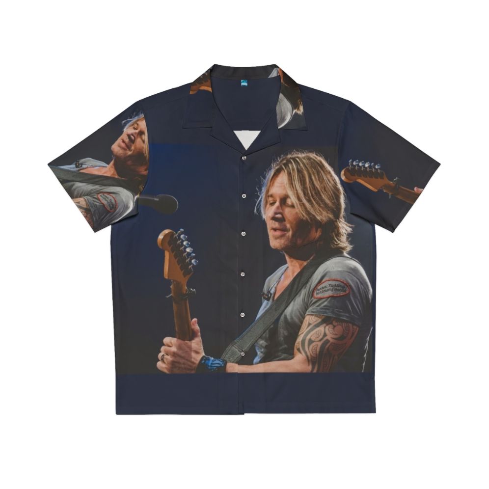 Keith Urban wearing a colorful Hawaiian shirt at a concert