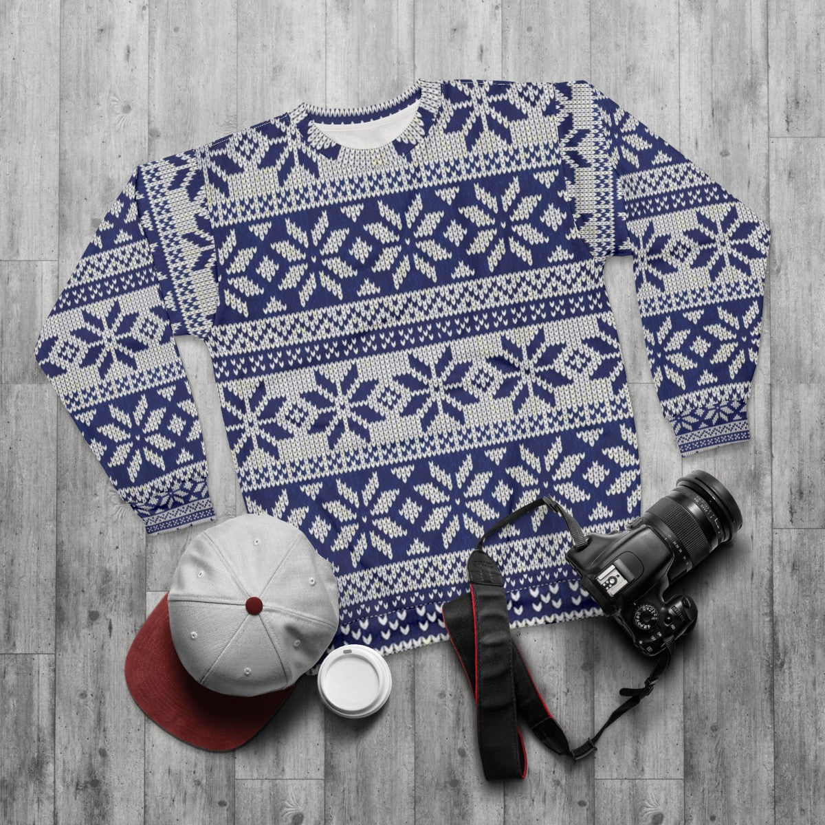 Cozy knit Christmas sweater with holiday reindeer pattern - flat lay