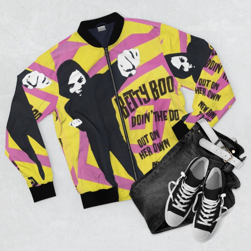 Retro 90s bomber jacket with 'Betty Boo Doin The Do' graphic - Flat lay