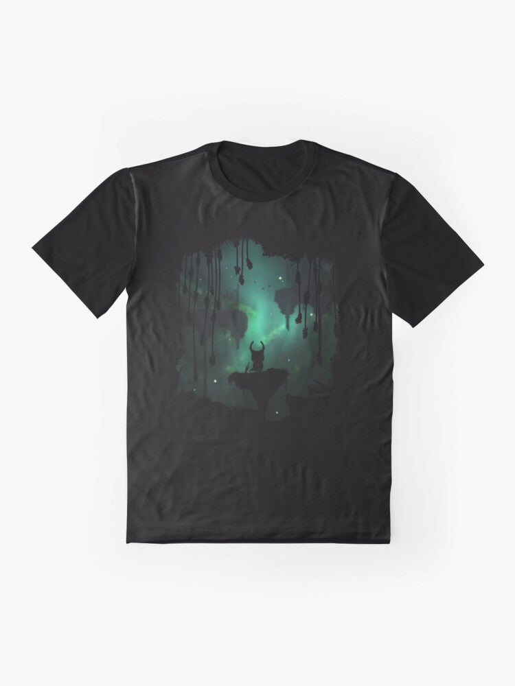 A graphic t-shirt featuring the Greenpath environment from the Hollow Knight game, with leafy elements, birds, and a peaceful nature theme. - Flat lay