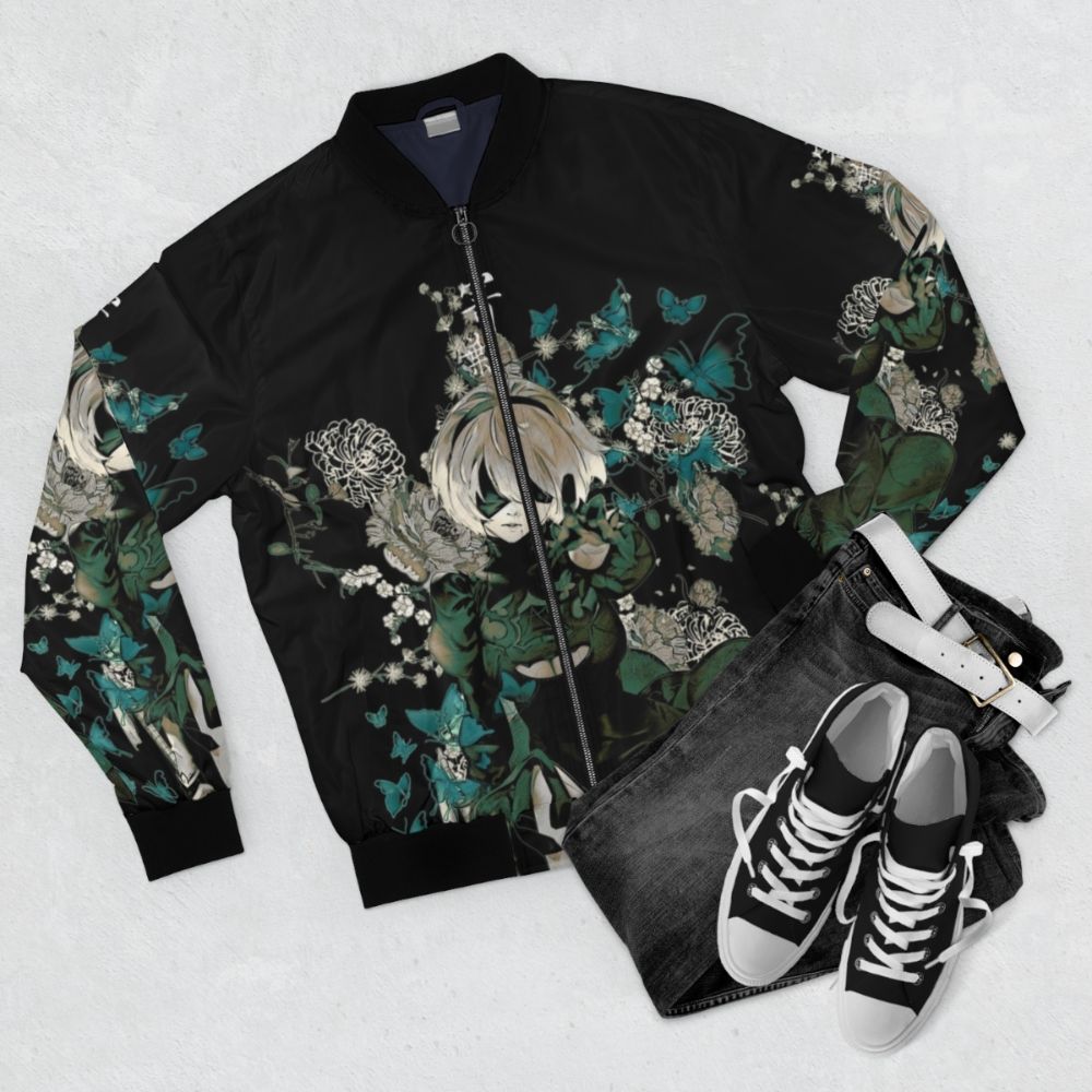 A fantasy-inspired dark floral bomber jacket with butterflies and anime-inspired design elements. - Flat lay