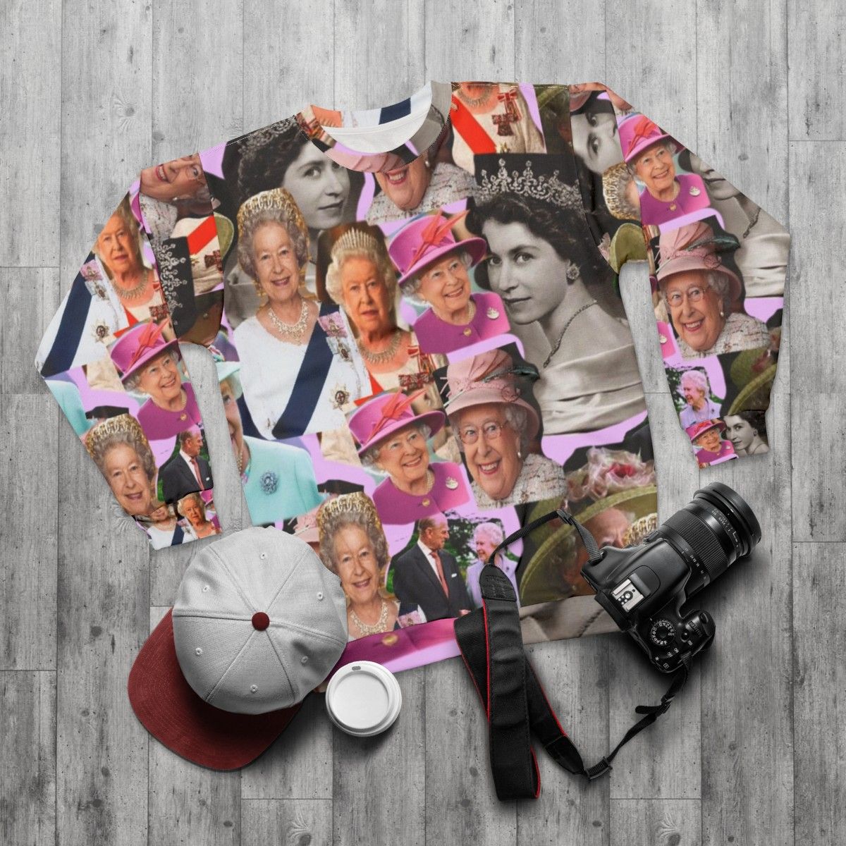 Queen Elizabeth II Sweatshirt featuring a pop art collage design - flat lay