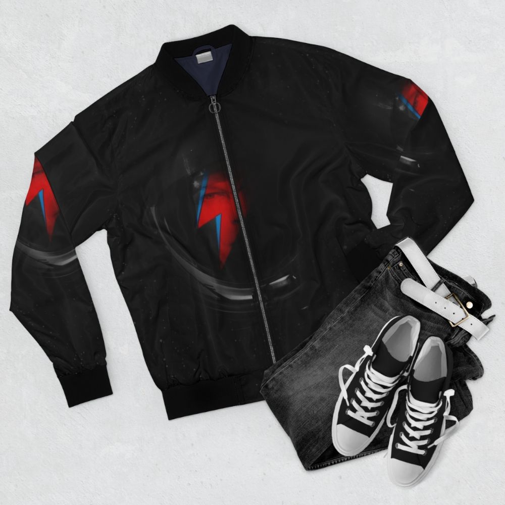 Space Odd VK Cosmic Bomber Jacket featuring a spaceman design and cosmic elements - Flat lay