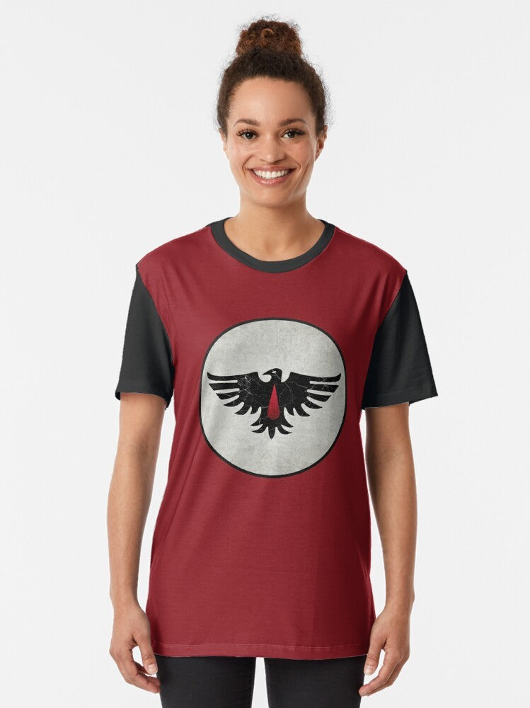 A graphic t-shirt featuring the iconic Blood Ravens chapter sigil and pauldrons of the Warhammer space marines. - Women