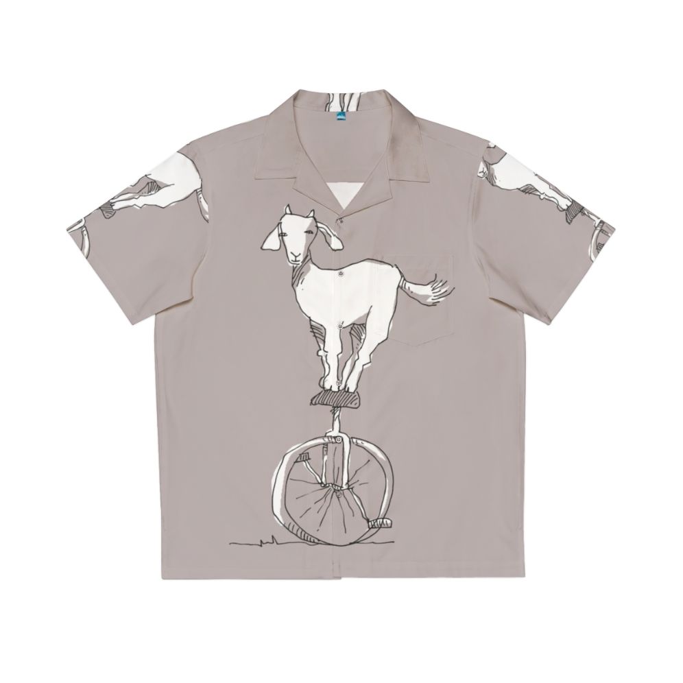 Goat riding unicycle on colorful Hawaiian shirt