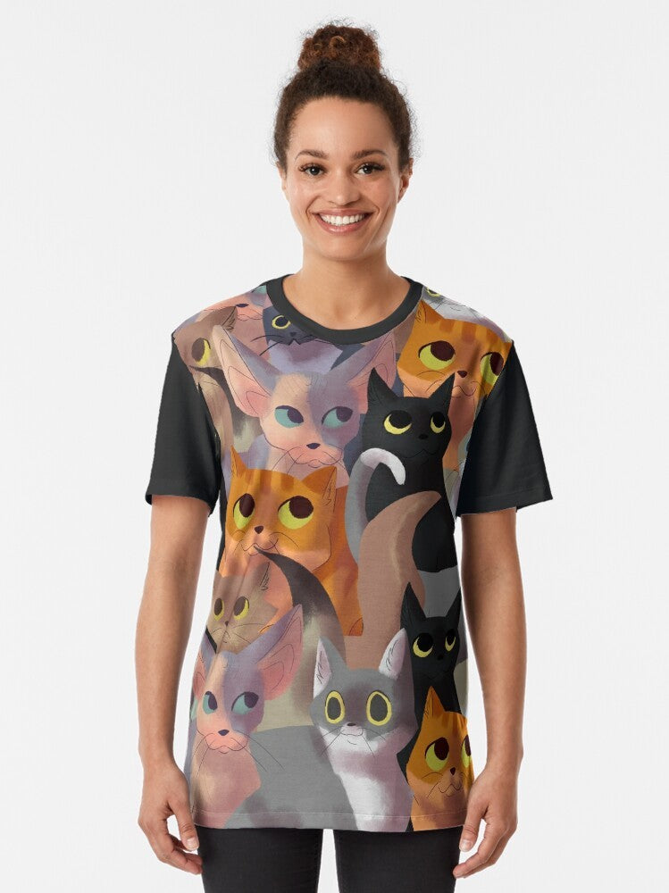 Graphic t-shirt featuring a cute and playful cat pattern design, ideal for cat lovers. - Women