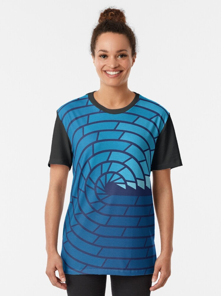 Minimalist ocean graphic design t-shirt featuring a geometric wave pattern in blue and white tones. - Women