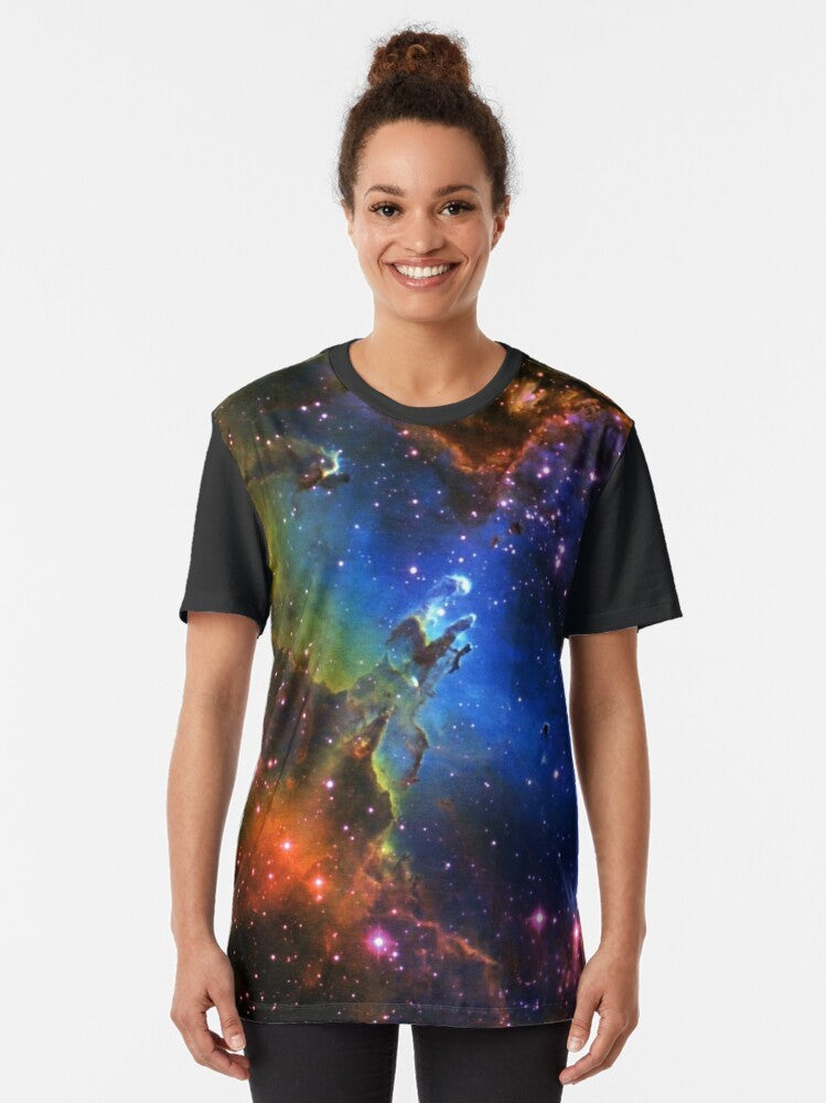 Graphic t-shirt with a stylized eagle design against a galaxy and nebula background - Women