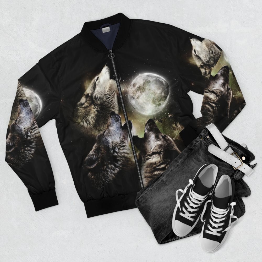 Three wolves howling at the full moon on a vintage-style bomber jacket - Flat lay