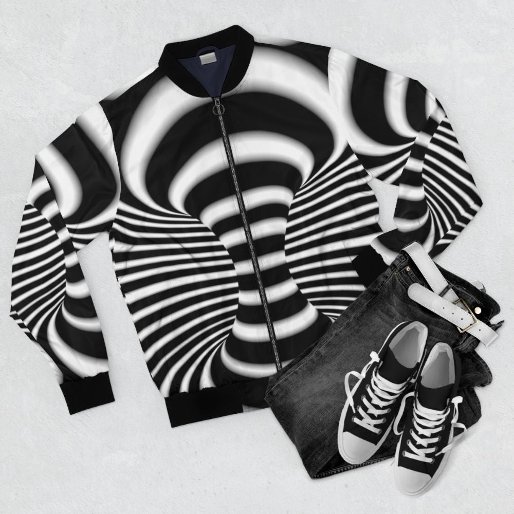 Black and white abstract optical illusion bomber jacket with 3D textile design and curved lines. - Flat lay