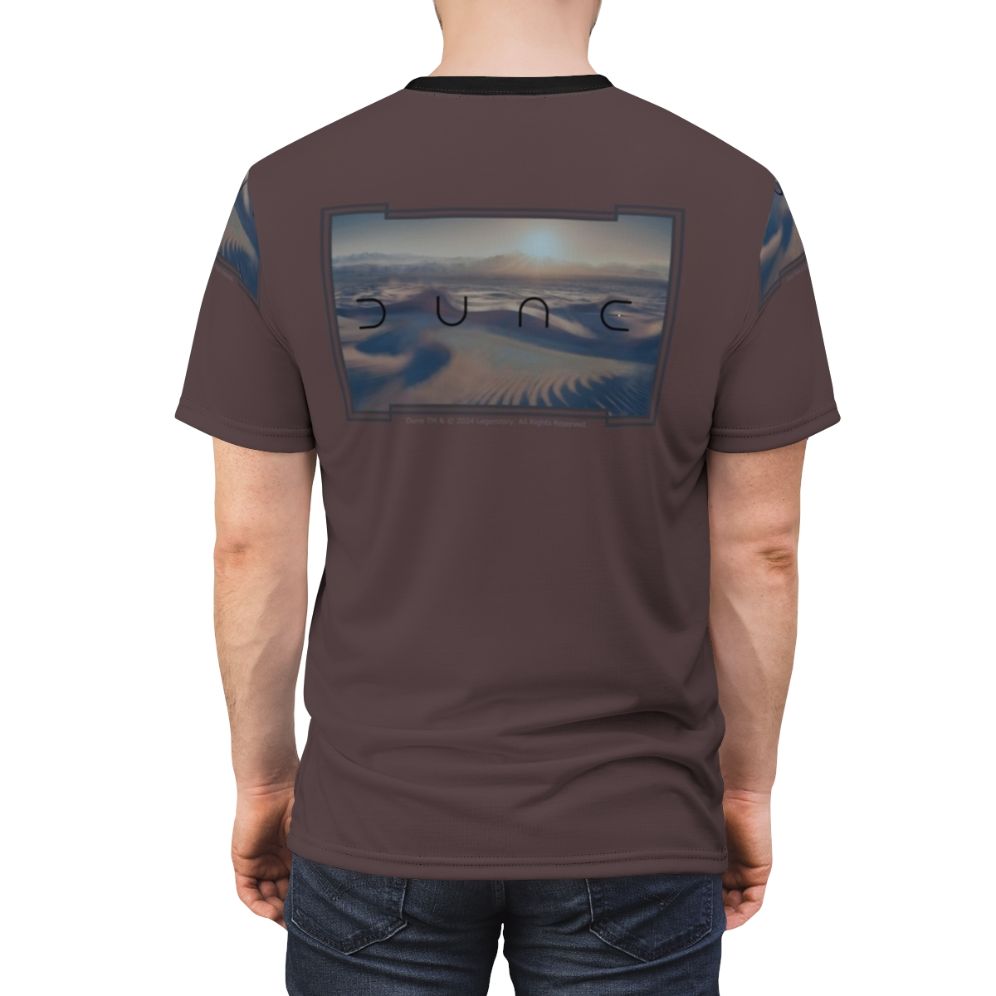 A t-shirt featuring a cinematic design inspired by the sci-fi epic Dune, with a desert landscape and futuristic elements. - men back