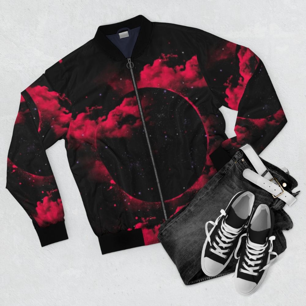 Black hole bomber jacket featuring a cosmic, space-inspired design - Flat lay